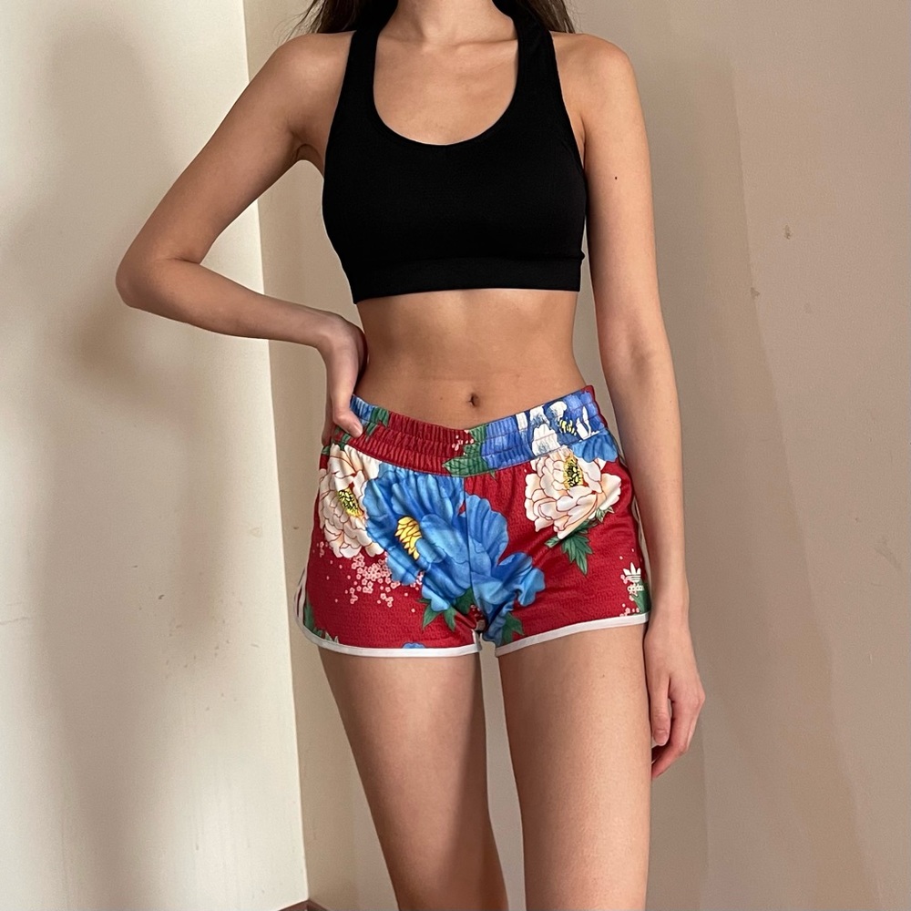 Adidas workout/lounge shorts. Red shorts with blue and white flowers, size S